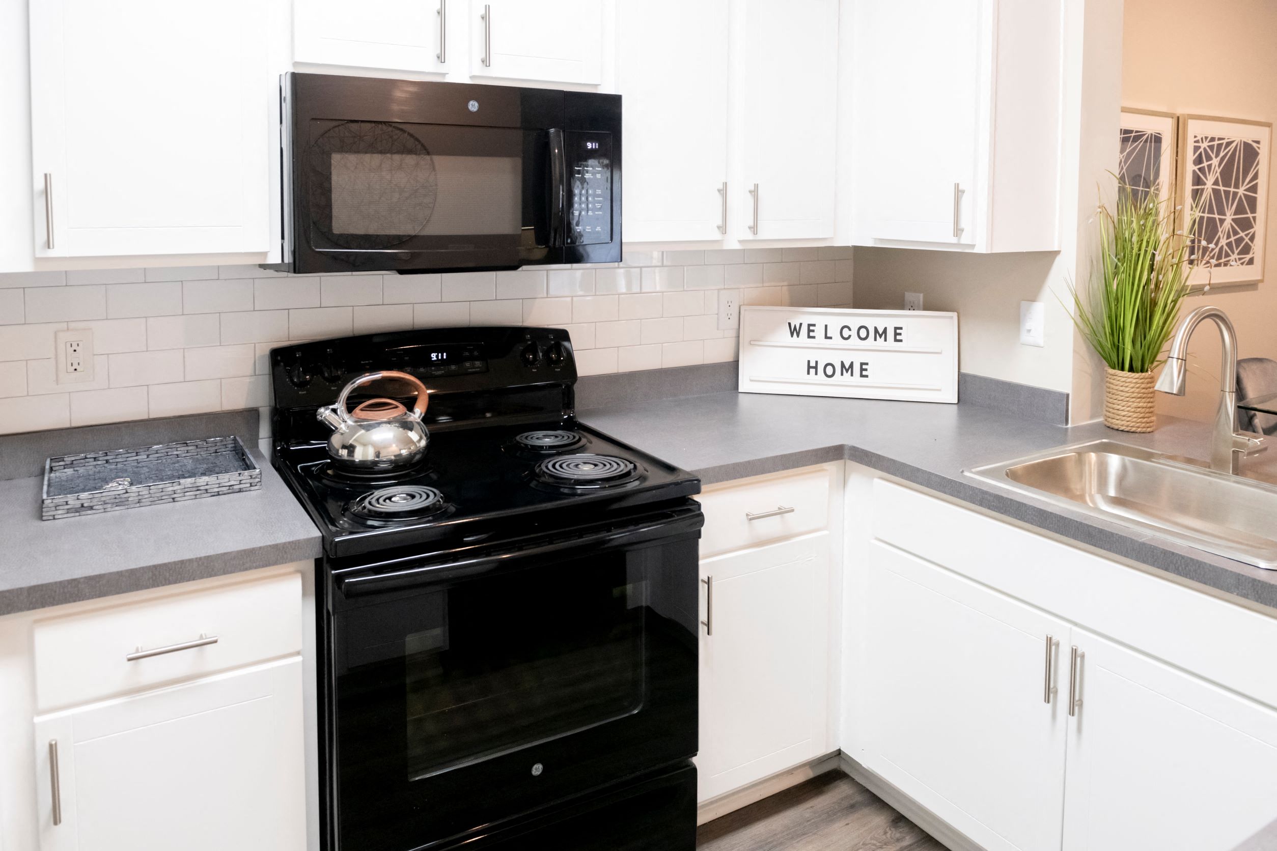 Kitchen with Black AppliancesDining Room and Kitchen with Barat 